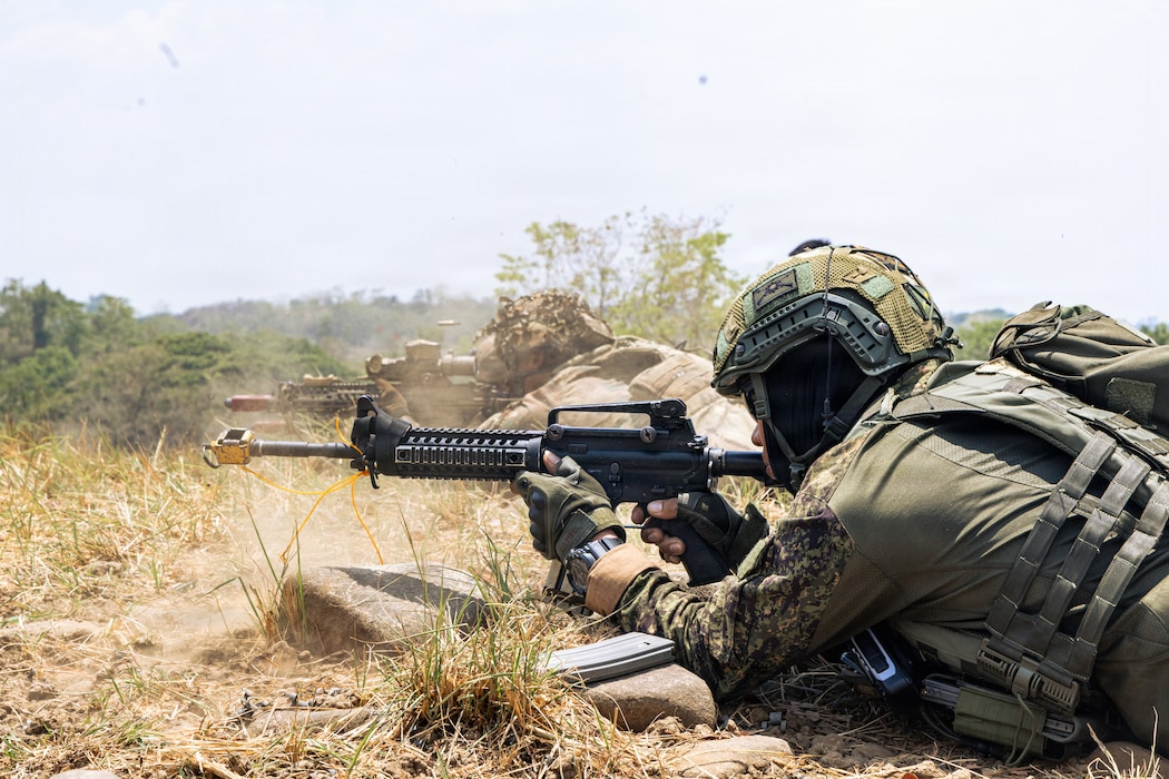 A Philippine Army soldier and U.S. Army Soldiers assigned to the 2nd Battalion, 21st Infantry Regiment, 3rd Mobile Brigade, 25th Infantry Division, engage targets during a blank-fire rehearsal ahead of a bilateral squad live-fire during Exercise Salaknib 2026 at Fort Magsaysay, Philippines, April 11, 2026.