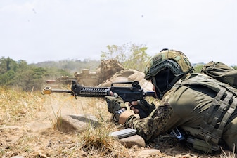 A Philippine Army soldier and U.S. Army Soldiers assigned to the 2nd Battalion, 21st Infantry Regiment, 3rd Mobile Brigade, 25th Infantry Division, engage targets during a blank-fire rehearsal ahead of a bilateral squad live-fire during Exercise Salaknib 2026 at Fort Magsaysay, Philippines, April 11, 2026.