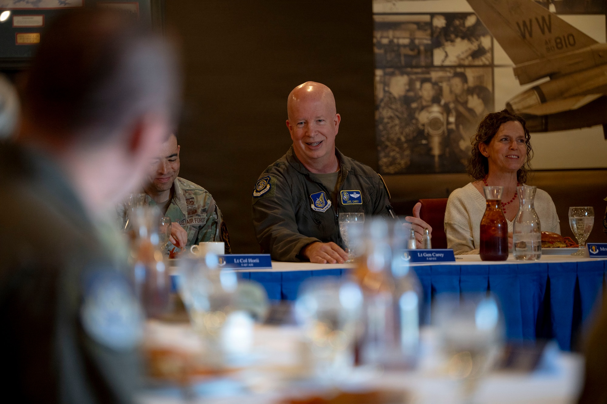 U.S. Air Force Lt. Gen. Joel Carey, Fifth Air Force commander, and his wife, Mendy Carey, have lunch with squadron commanders, senior enlisted leaders and their spouses.