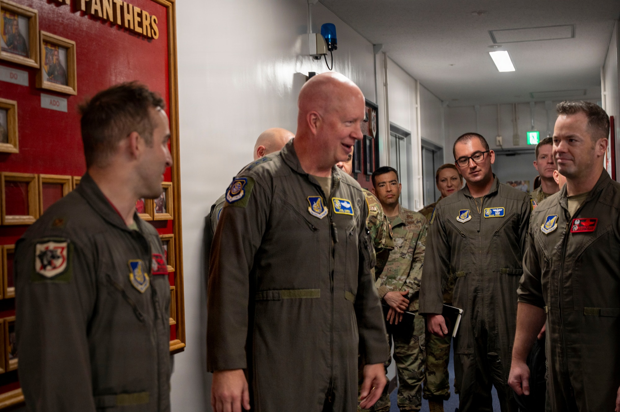 U.S. Air Force Lt. Gen. Joel Carey, Fifth Air Force commander, speaks with pilots and Airmen assigned to the 13th Fighter Squadron during an immersion tour.