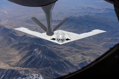 A U.S. Air Force B-21 Raider conducts aerial refueling with a KC-135 Stratotanker. The B-21 program exemplifies the Department of the Air Force's warfighting-focused acquisition mindset, leveraging digital engineering and modern production to deliver a mature, highly capable system at speed. The B-21's efficiency and flexibility will provide a survivable, unpredictable deterrent force, forming the backbone of America’s future bomber force.  (U.S. Air Force photo)