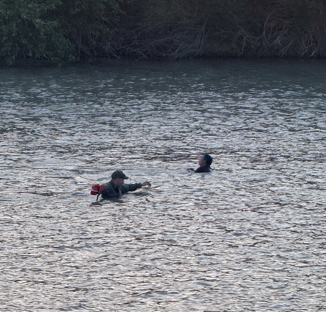 U.S. Border Patrol agents, Texas state troopers and U.S. Army Soldiers assigned to Joint Task Force-Southern Border rescue three illegal aliens attempting to cross the U.S. southern border near Laredo, Texas, April 1, 2026.