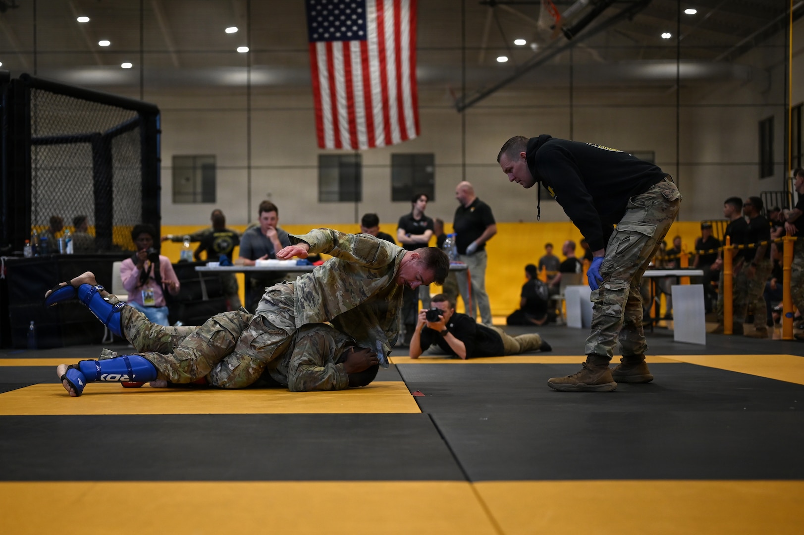 U.S. Army National Guard Soldiers representing Pennsylvania, Ohio, Nevada, Guam, and the District of Columbia compete during day two of the 2026 Lacerda Cup All-Army Combatives Championship at Fort Benning, Ga. Apr. 9, 2026. Fighters progress through the quarterfinals and semifinals to earn their championship cage match bouts. The competition features eight-person teams and individual Soldiers performing multiple close-quarters combatives techniques, proving their readiness to close with and destroy the enemy in hand-to-hand combat.