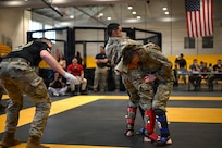 U.S. Army National Guard Soldiers representing Pennsylvania, Ohio, Nevada, Guam, and the District of Columbia compete during day two of the 2026 Lacerda Cup All-Army Combatives Championship at Fort Benning, Ga. Apr. 9, 2026. Fighters progress through the quarterfinals and semifinals to earn their championship cage match bouts. The competition features eight-person teams and individual Soldiers performing multiple close-quarters combatives techniques, proving their readiness to close with and destroy the enemy in hand-to-hand combat.