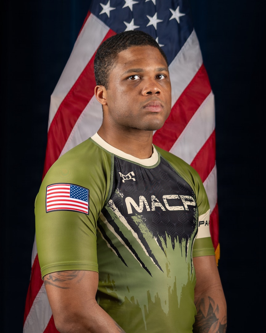 Army National Guard Combatives team member Spc. Wilson Maliek, 276th Military Police Co., District of Columbia National Guard, poses for a portrait ahead of the 2026 Army Lacerda Cup (All-Army Combatives Championship) taking place at Fort Benning, Georgia, April 7, 2026.