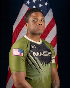 Army National Guard Combatives team member Spc. Wilson Maliek, 276th Military Police Co., District of Columbia National Guard, poses for a portrait ahead of the 2026 Army Lacerda Cup (All-Army Combatives Championship) taking place at Fort Benning, Georgia, April 7, 2026.