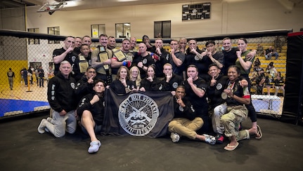 U.S. Army National Guard Soldiers compete in the finals during day three of the 2026 Lacerda Cup All-Army Combatives Championship at Fort Benning, Ga. Apr. 10, 2026. The two Army National Guard teams finished the tournament with third and sixth place team standings out of twenty-one teams competing, with three National Guard Soldiers earning championship belts.