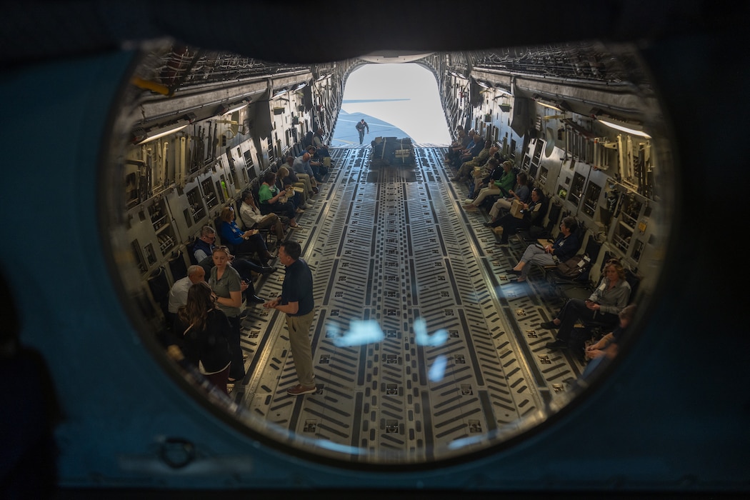 Air Mobility Command civic leaders sit inside a C-17 Globemaster III aircraft at Vance Air Force Base, Oklahoma, April 8, 2026. The flight transported the civic leaders to Altus Air Force Base, Oklahoma, for an immersion tour and provided them with a firsthand look at aerial refueling operations. (U.S. Air Force photo by Airman 1st Class Nathan Langston)