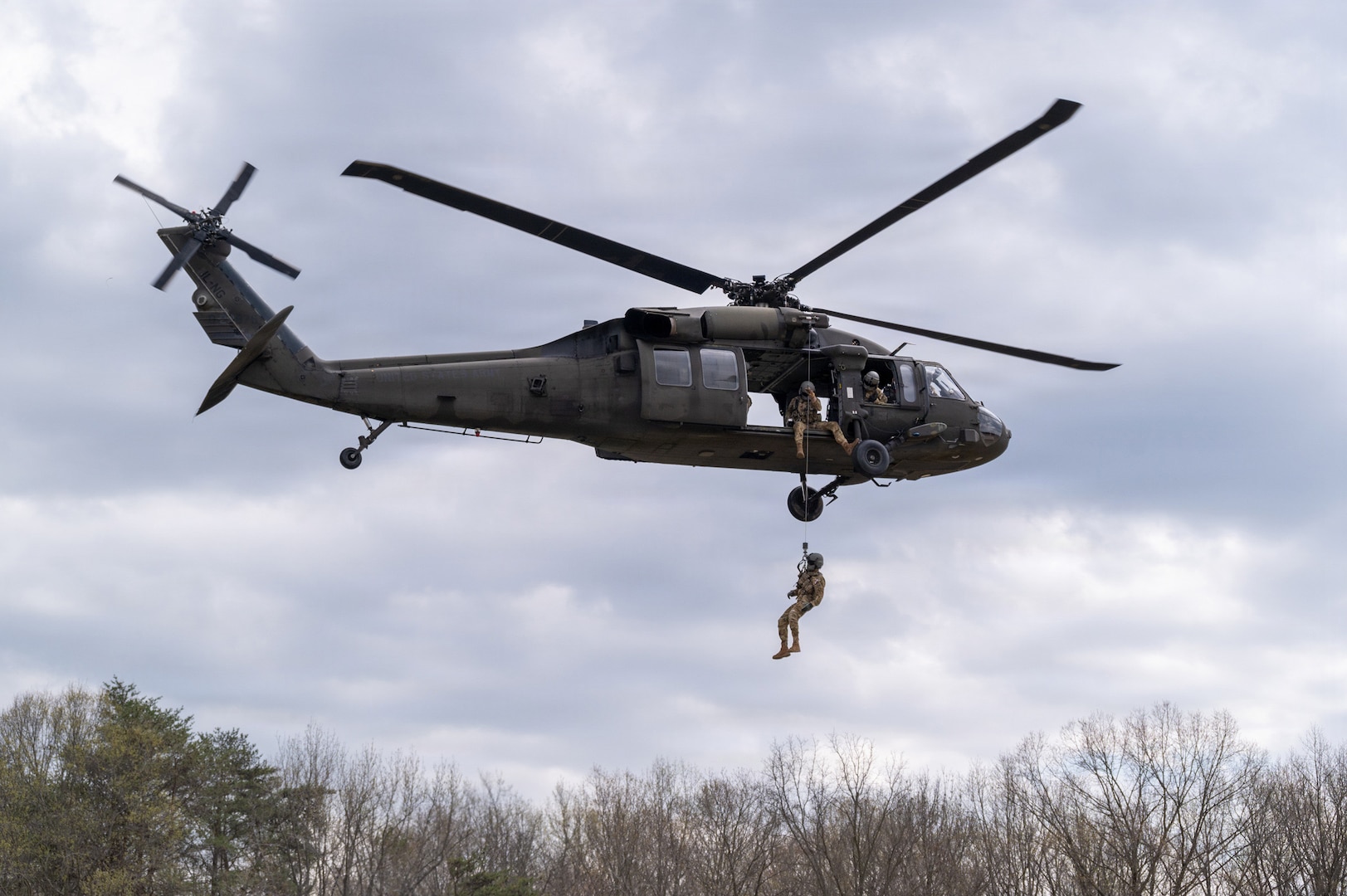 Maryland Army National Guardsmen of the 29th Combat Aviation Brigade lift a rescue seat into a UH-60 Black Hawk helicopter at Lauderick Creek Military Reservation, Edgewood, Maryland, April 1, 2026.