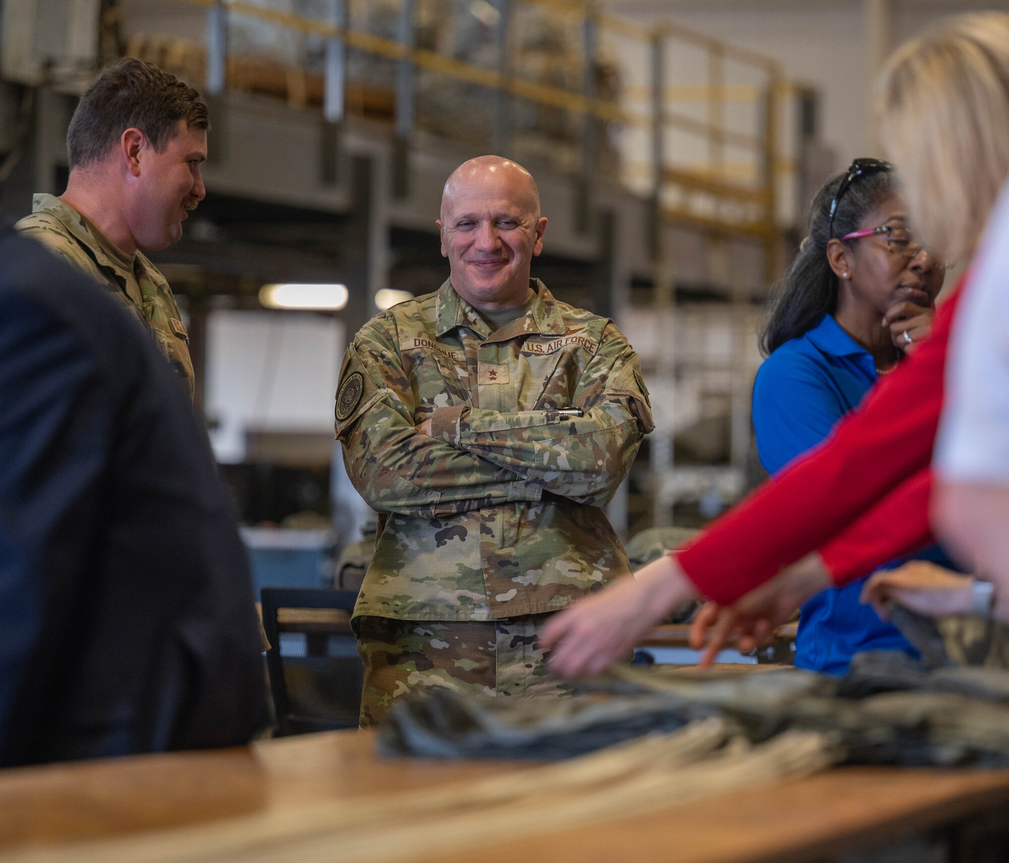 U.S. Air Force Maj. Gen. Gerald Donohue, Interim Air Mobility Command (AMC) deputy commander, views an interactive parachute building demonstration at Altus Air Force Base, Oklahoma, April 9, 2026. The visit from AMC senior leaders and civic leaders reinforced the strong partnership between Altus and AMC. (U.S. Air Force photo by Airman 1st Class Emma Wright)