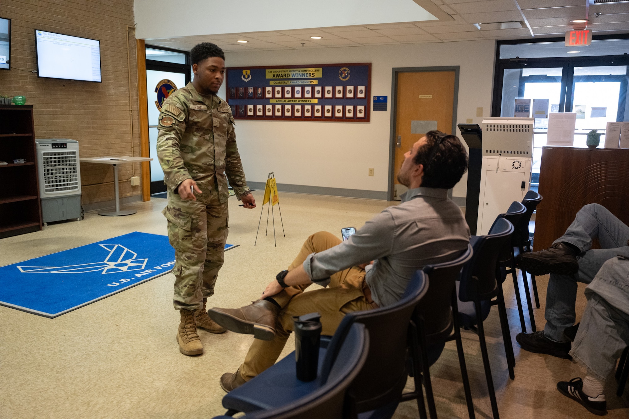 A man specks with a customer