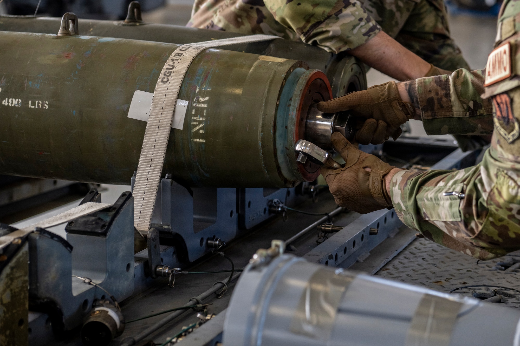 Airman building a munitions device.