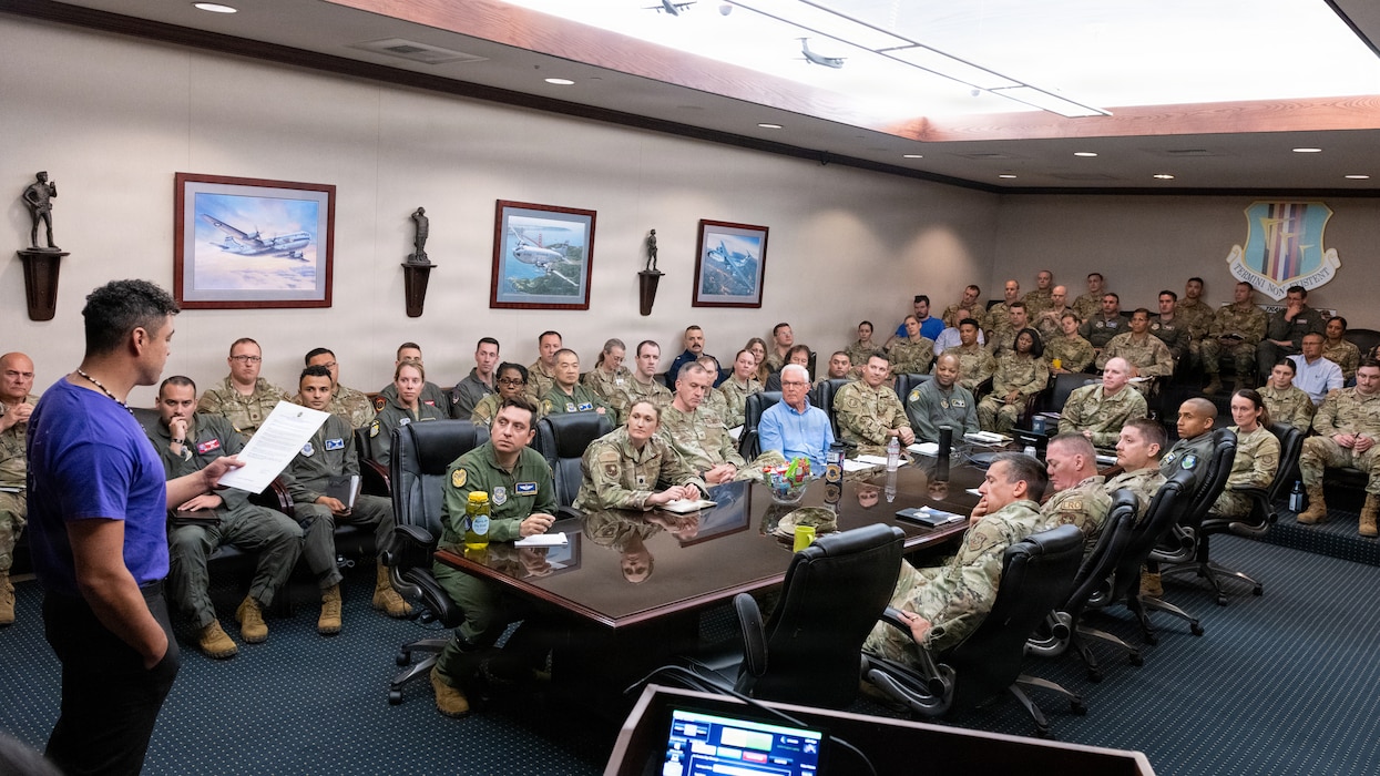 Travis leadership listen to speaker about Month of the Military Child