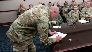 Wing Commander signs proclamation for Month of the Military Child