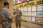 Chief Master Sgt. of the Air Force David Wolfe speaks with service members during a visit to the Military Entrance Processing Station at Joint base San Antonio-Fort Sam Houston, Texas, April,1, 2026. CMSAF Wolfe visits MEPS to meet new Airmen at the start of their careers, watch the enlistment process, and boost morale. These visits are part of a larger effort to connect with Airmen at all levels, from new recruits to senior leaders, to hear their concerns and help shape the culture of the force. (U.S. Air Force photo by (U.S. Air Force photo by Melissa Hydrick)