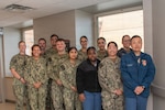 PORTSMOUTH, Va. (April 13, 2026) Corpsmen and Corpsman Residency Program (HMRP) facilitators take a group photo at Naval Medical Center Portsmouth (NMCP), April 13, 2026. HMRP is a 10-week cohort program that aims to provide standardized training and integration into the medical field for new corpsman, blending administrative, on-boarding processes, hands-on clinical skills training and simulation, military readiness, and rotations across in-patient units. It is an exciting opportunity for corpsmen to branch out of their assigned roles and learn about a variety of different functions in the medical center. (U.S. Navy photo by Mass Communication Specialist 2nd Class Thomas Boatright)