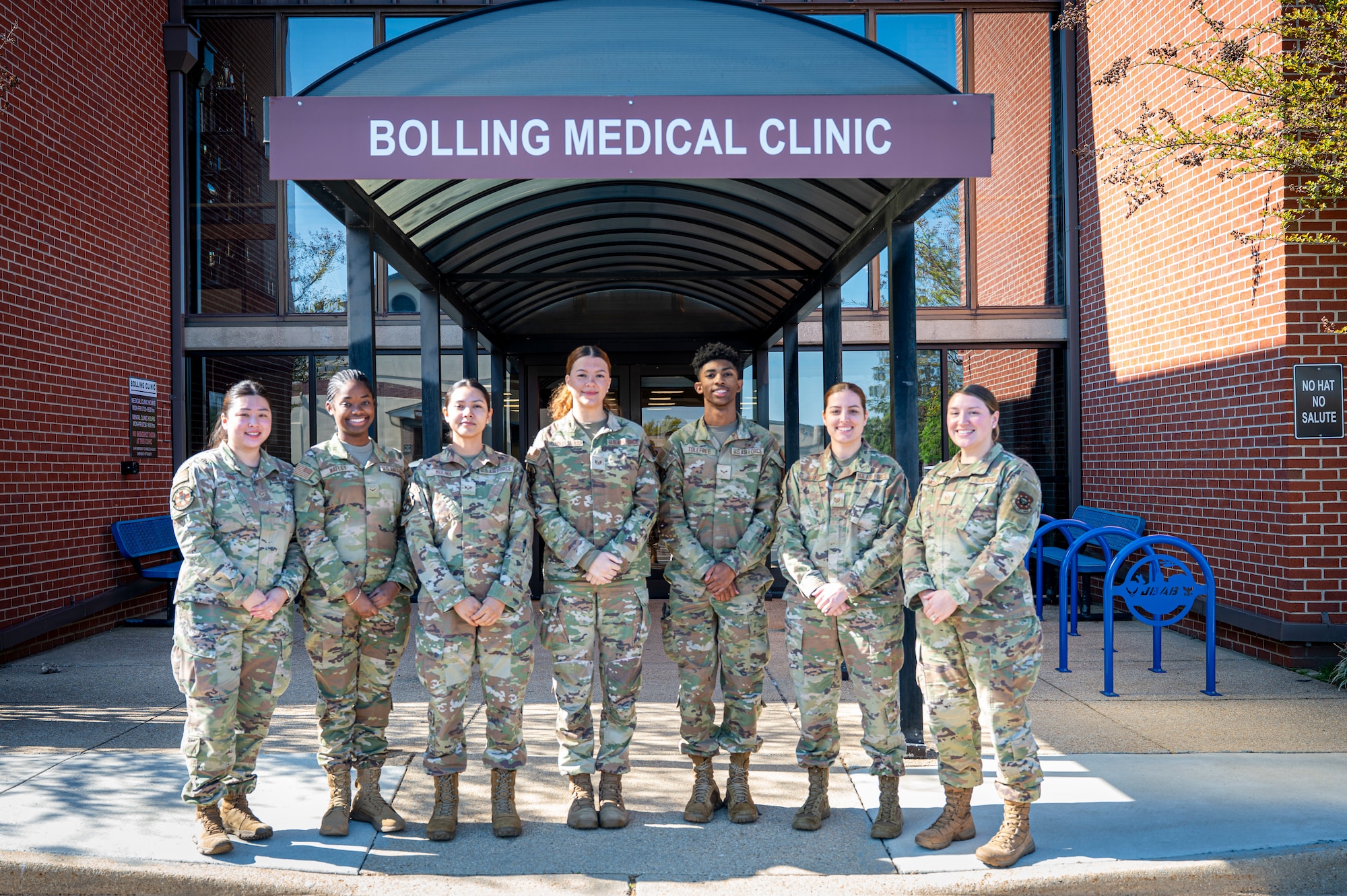 Members of the Bolling Medical Squadron’s Public Health unit gather for a photo in front of the Bolling Medical Clinic at Joint Base Anacostia-Bolling, Washington, D.C., April 8, 2026. During the past year, BMS Public Health supported the Food Safety and Sanitation program by inspecting 37 food facilities and 17 public facilities on the JBAB installation to protect more than 18,000 military personnel, federal civilian employees and military family members against foodborne illnesses. (U.S. Air Force photo by Senior Airman Shanel Toussaint)