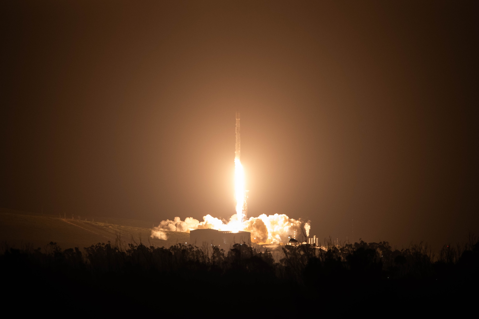RA Falcon 9 rocket carrying the Starlink 17-21 mission launches from Space Launch Complex 4 East at Vandenberg Space Force Base, Calif., April 10, 2026. The Starlink 17-21 mission marked the 24th launch and test mission from Vandenberg SFB in 2026.
