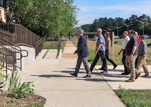 Personnel from U.S. Space Command’s Joint Intelligence Support Element (JISE) enter their new facility at Redstone Arsenal, Alabama, April 15, 2026. This move helps secure the very first operational facility USSPACECOM will inhabit on the Redstone. USSPACECOM, working with Allies and Partners, plans, executes, and integrates military spacepower into multi-domain global operations in order to deter aggression, defend national interests, and when necessary, defeat threats. (Courtesy photo)