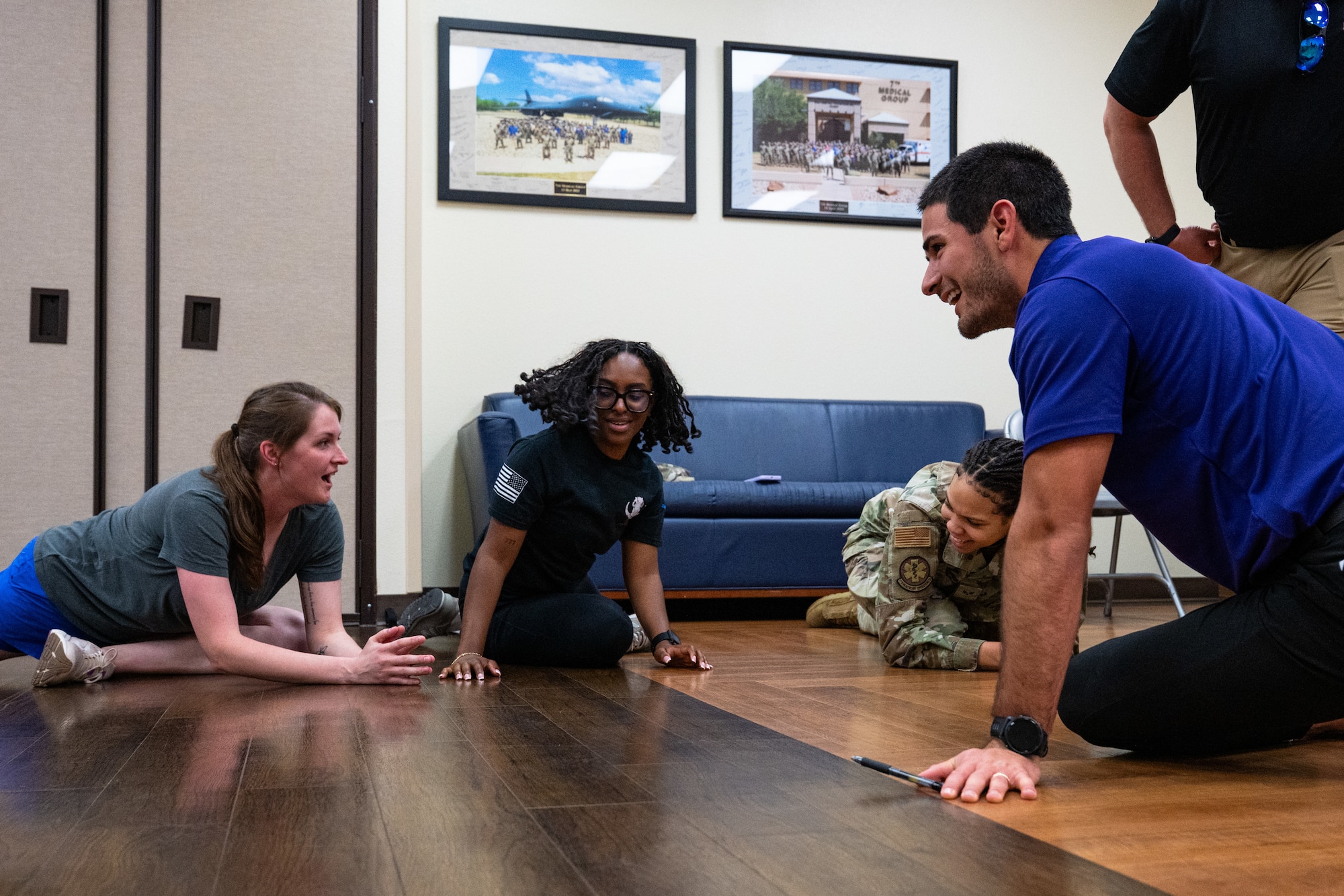 Members of the Hardin-Simmons University physical therapy program observe the movement patterns of U.S. Airmen during a collaborative training event with the 7th Medical Group at Dyess Air Force Base, Texas, April 10, 2026. The event emphasized joint learning and the practical application of physical therapy techniques to enhance Airman readiness. (U.S. Air Force photo by Senior Airman Jade M. Caldwell)
