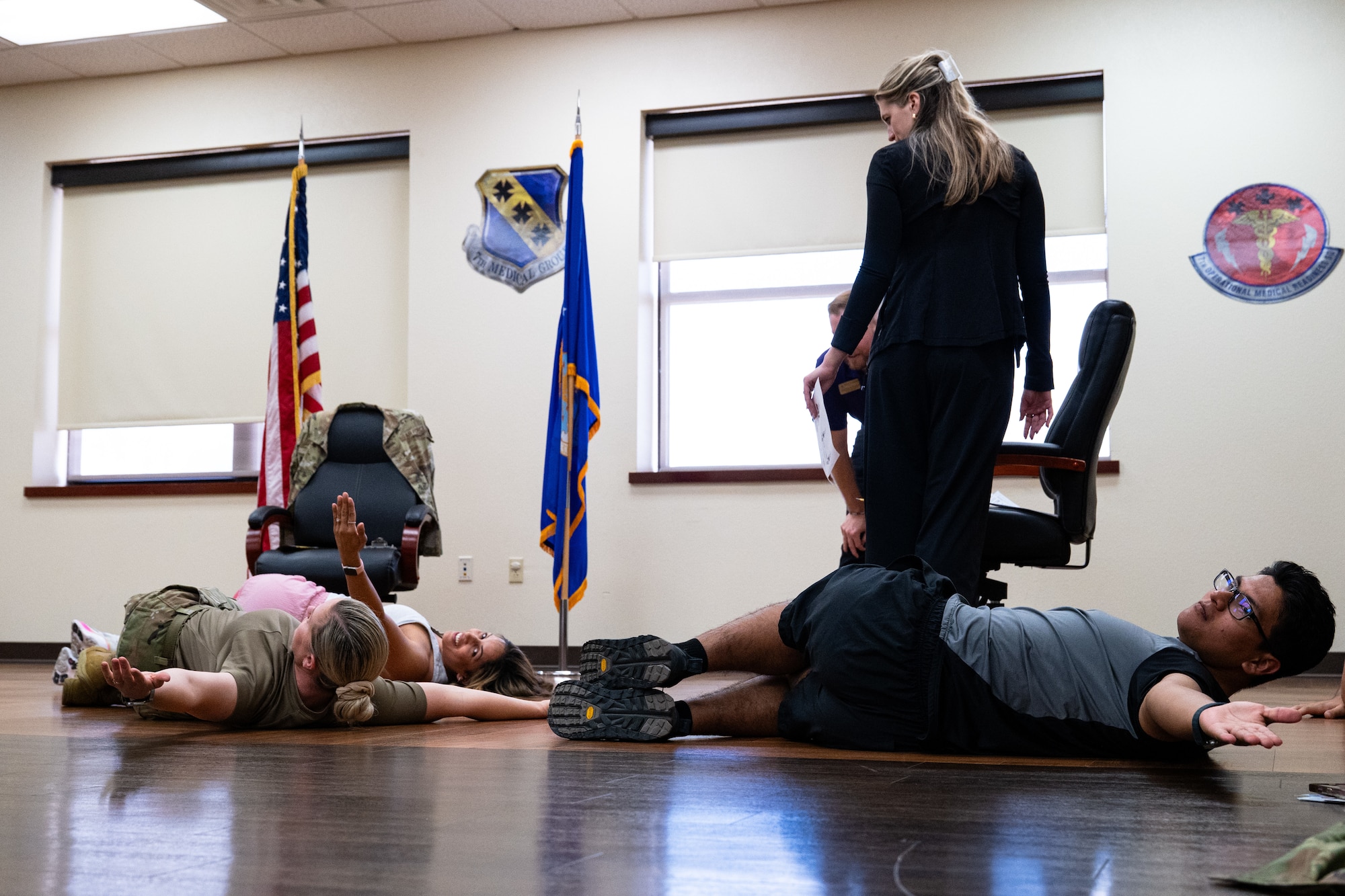 Ainsley Bricker, Hardin-Simmons University physical therapy student, observes an exercise during a collaborative training event with the 7th Medical Group at Dyess Air Force Base, Texas, April 10, 2026. The event provided participants with feedback on recovery, stability, and musculoskeletal function. (U.S. Air Force photo by Senior Airman Jade M. Caldwell)