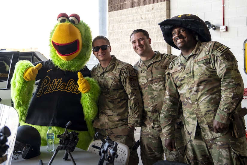 Airman from the 171st Air Refueling Wing take a photo with Pirate Parrot, the official mascot for the Pittsburgh Pirates, during an All-Star Leadership Day in Pittsburgh, Pennsylvania, April 15, 2026. Airmen shared their experiences and perspectives, encouraging students to consider leadership roles and STEM-focused careers within the U.S. Air Force. (U.S. Air National Guard photo by Tech. Sgt. Zoe M. Wockenfuss)