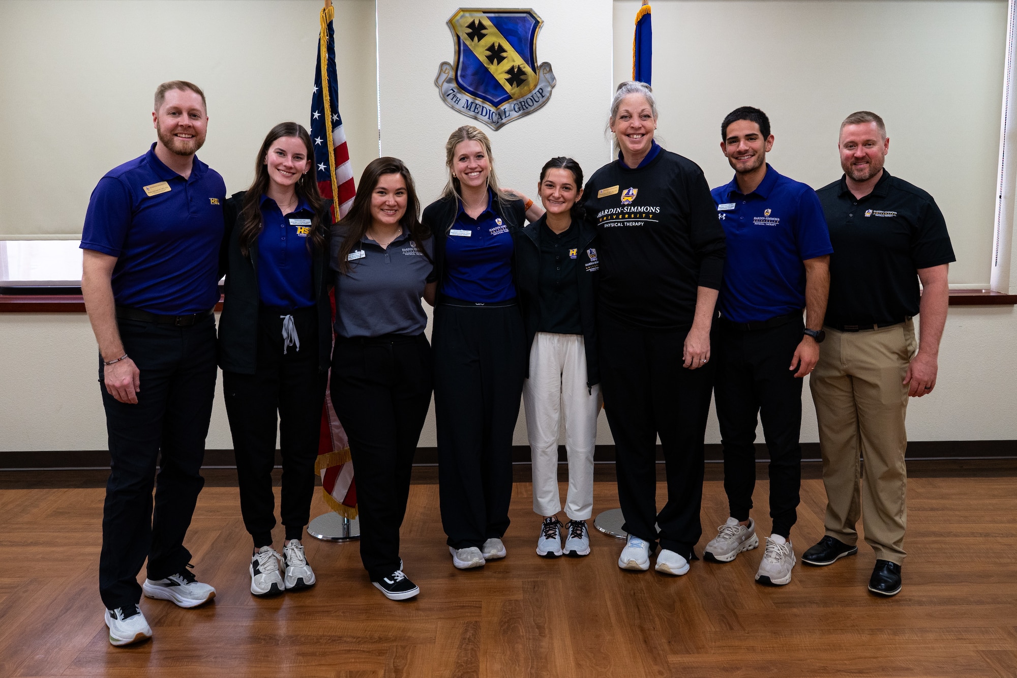 Hardin-Simmons University physical therapy students and staff gather for collaborative training session with the 7th Medical Group at Dyess Air Force Base, Texas, April 10, 2026. The event emphasized joint learning and the practical application of physical therapy techniques to enhance Airman readiness. (U.S. Air Force photo by Senior Airman Jade M. Caldwell)
