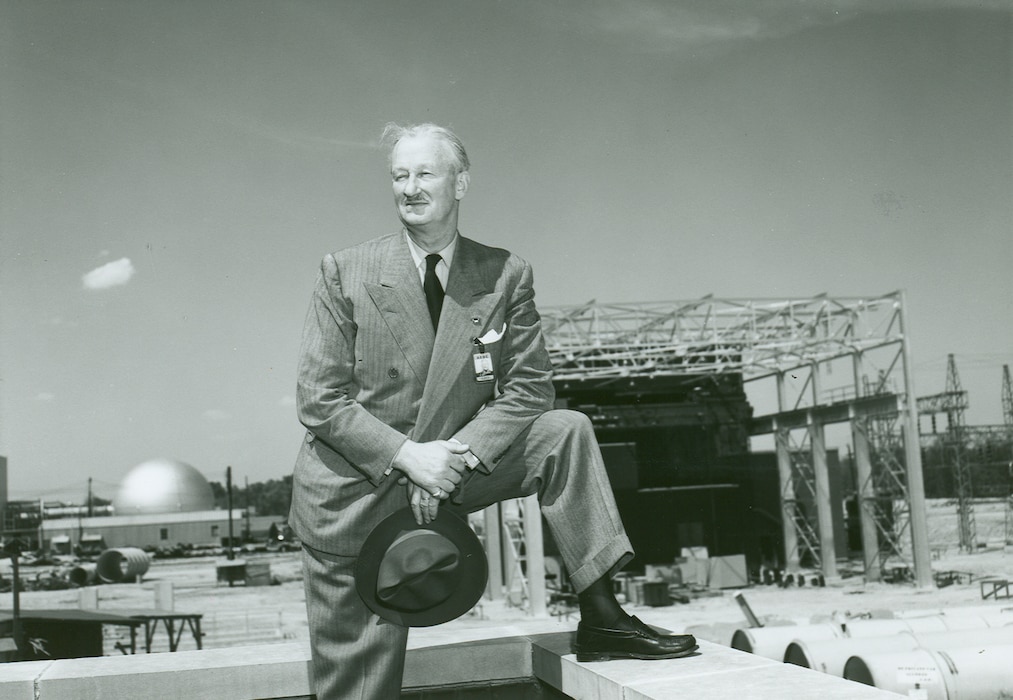 Maj. Gen. Leif Sverdrup poses for a photo in front of the then-under construction Arnold Engineering Development test facility in 1955. Sverdrup served as president of Arnold Research Organization Inc., the first company awarded a contract to operate AEDC. (U.S. Air Force photo)