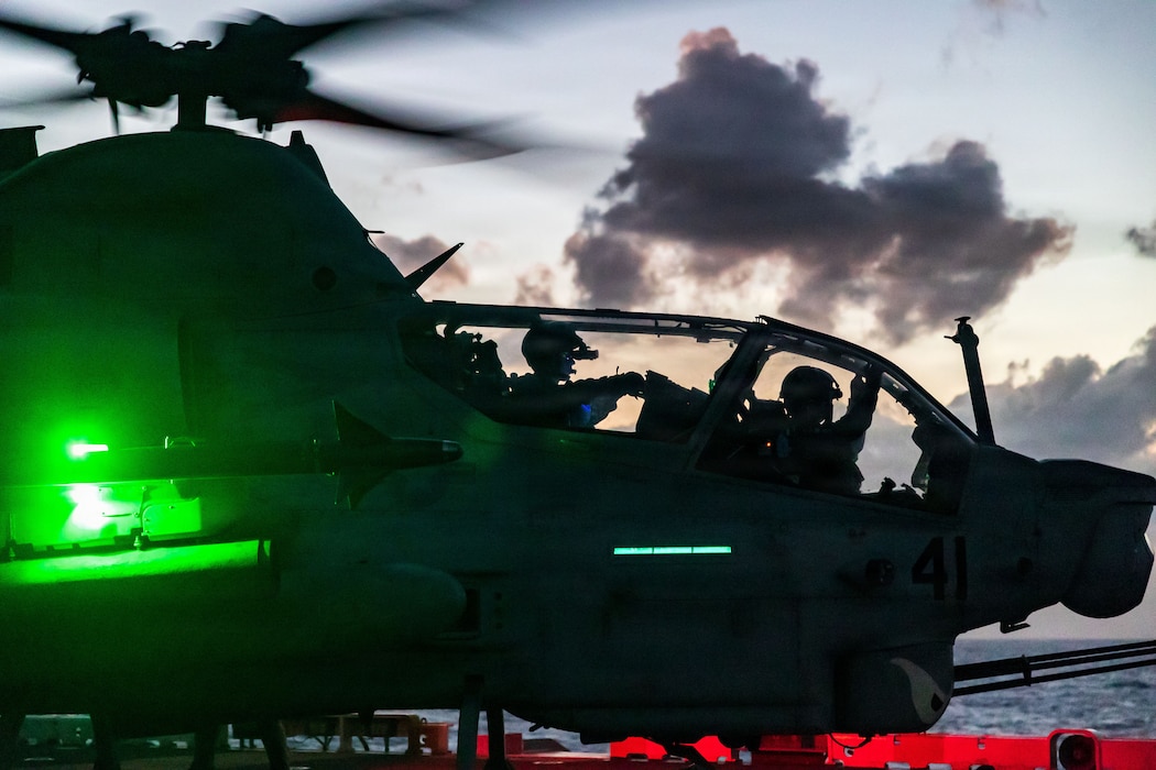 U.S. Marines with Marine Medium Tiltrotor Squadron (VMM) 163 (Reinforced), 11th Marine Expeditionary Unit, prepare to take off from the flight deck aboard Wasp-class amphibious assault ship USS Boxer (LHD 4) in the Pacific Ocean, April 7, 2026.