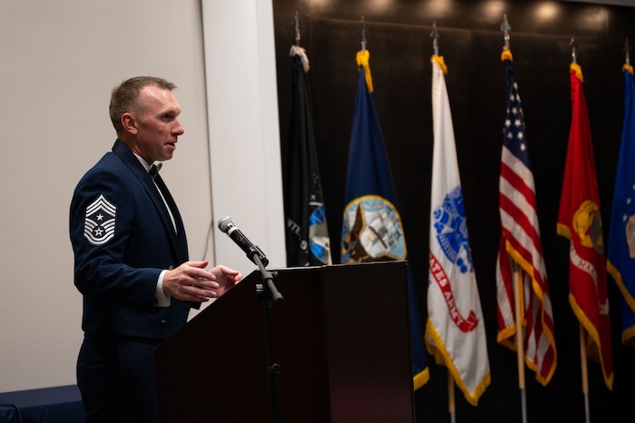 U.S. Air Force Chief Master Sgt. Derek Neill, 17th Training Wing command chief, speaks at the Chief Recognition Ceremony at the Powell Event Center.