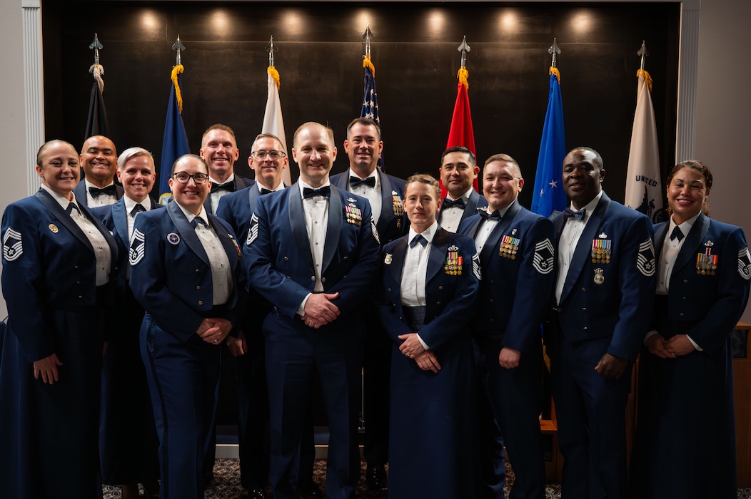 U.S. Air Force Chief Master Sergeants and Chief Master Sergeant Selects pose for a picture during the Chief Recognition Ceremony.