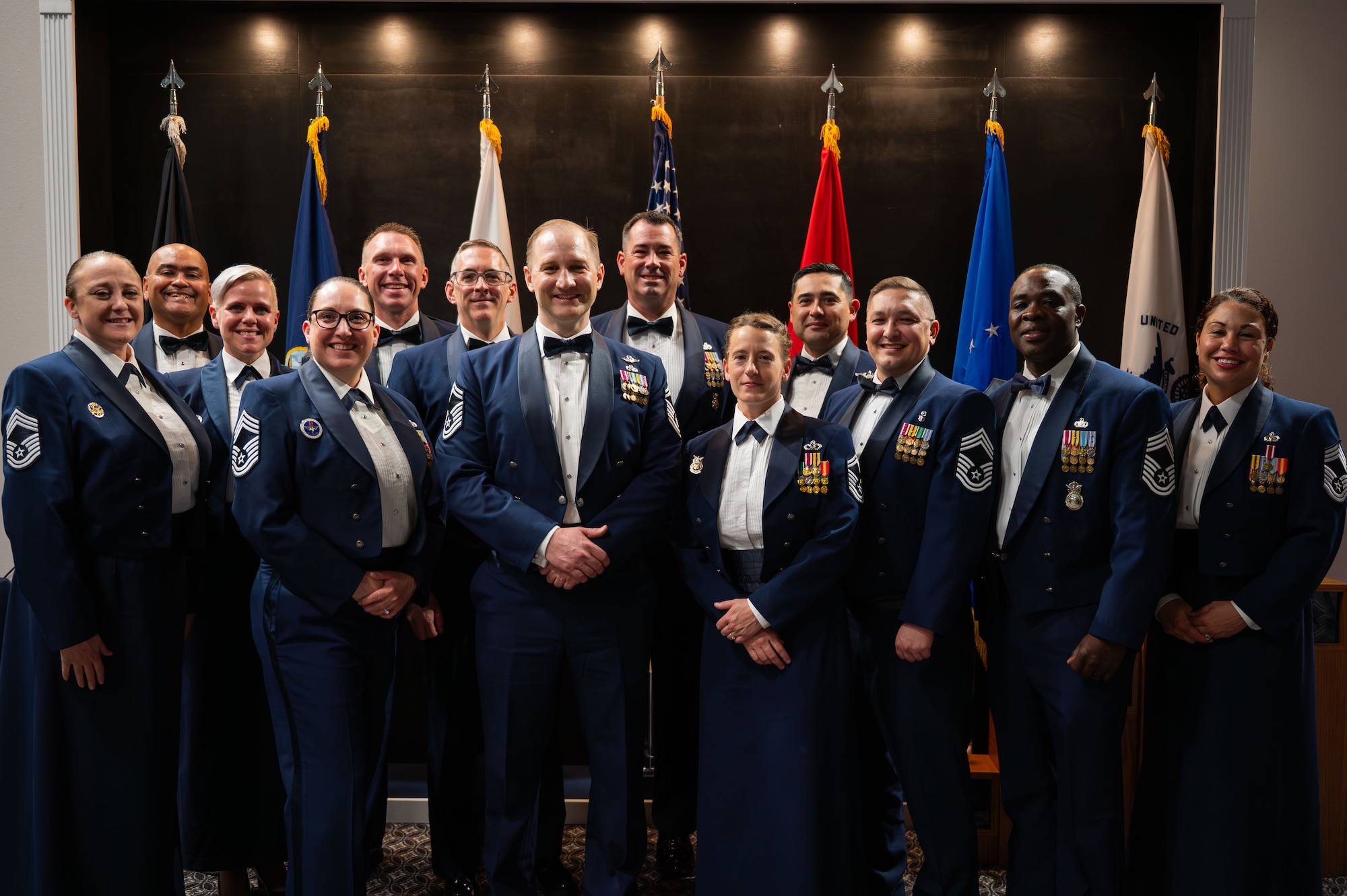 U.S. Air Force Chief Master Sergeants and Chief Master Sergeant Selects pose for a picture during the Chief Recognition Ceremony.