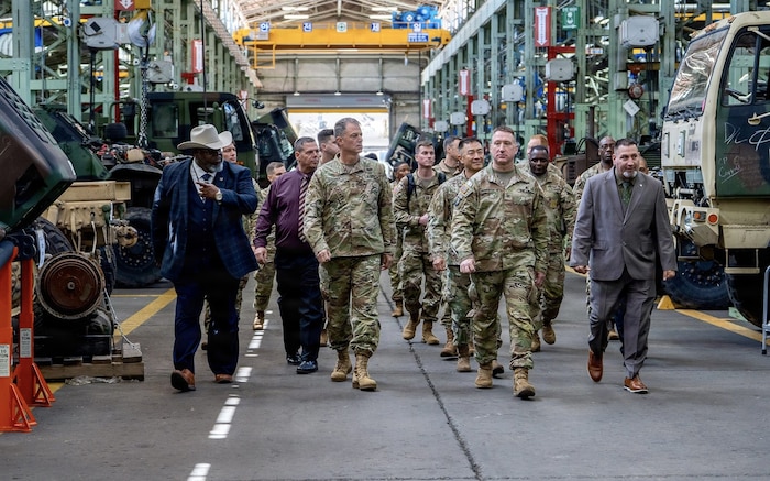 U.S. Army Maj. Gen. Gavin Gardner, commanding general of the 8th Theater Sustainment Command, and Brig. Gen. Jin Pak, commanding general of the 19th Expeditionary Sustainment Command, walk through the Combat Power Generation Center at Camp Carroll, Waegwan, Republic of Korea, April 7, 2026.