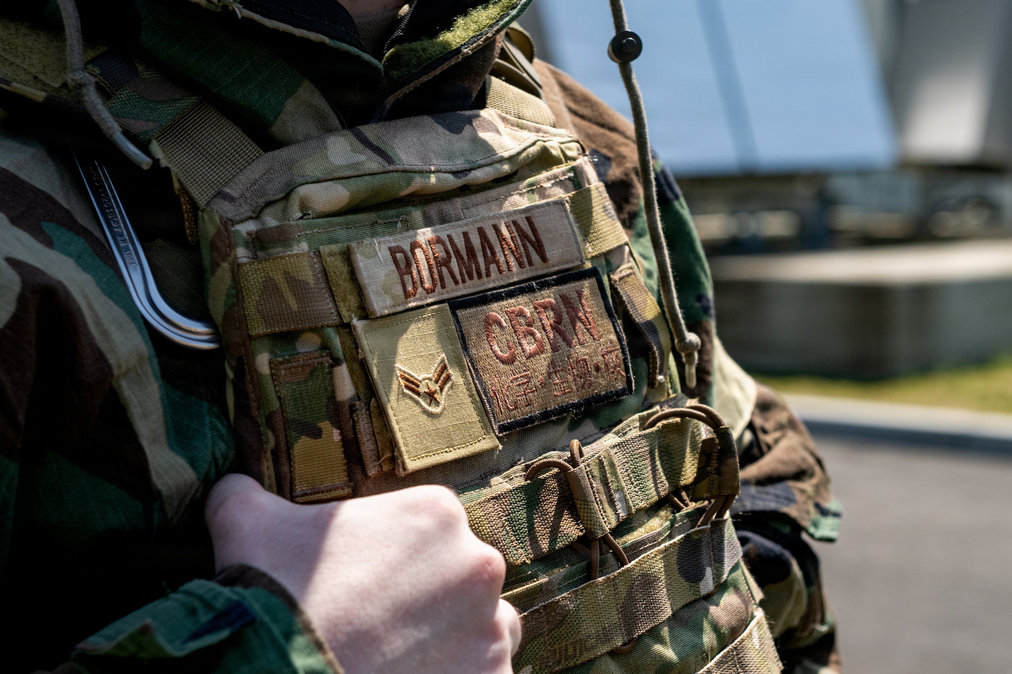 U.S. Air Force Airman 1st Class Gabriel Bormann, 35th Civil Engineer Squadron emergency management journeyman, displays his combat gear during a chemical, biological, radiological and nuclear (CBRN) class.