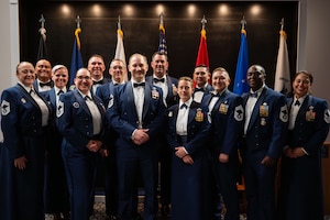 U.S. Air Force Chief Master Sergeants and Chief Master Sergeant Selects pose for a picture during the Chief Recognition Ceremony.