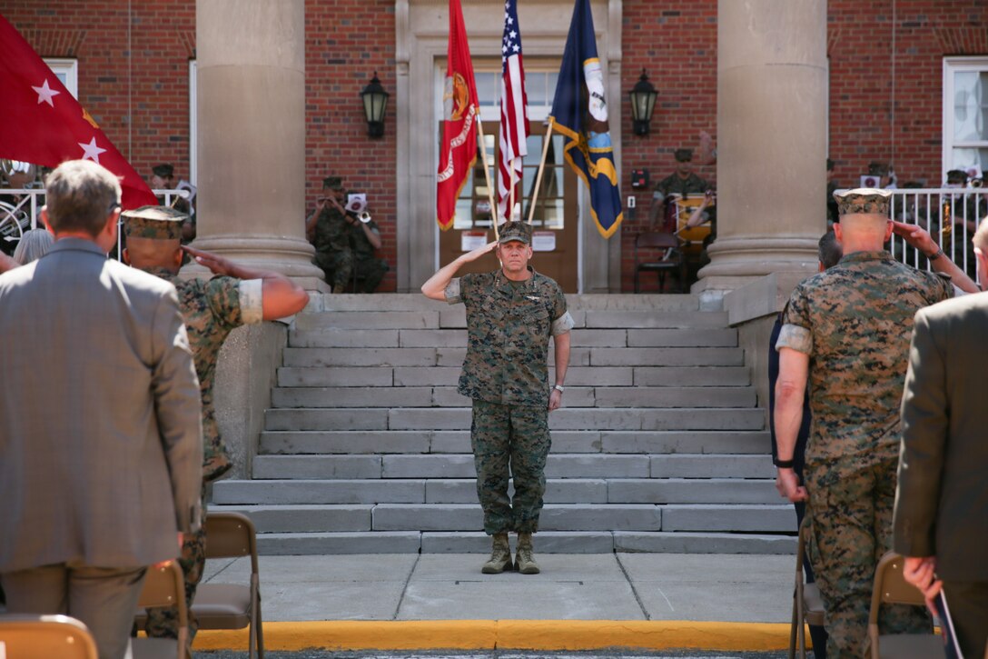U.S. Marine Corps Lt. Gen. Eric E. Austin, the commanding general of Marine Corps Combat Development Command and deputy commandant for Combat Development and Integration salutes during the establishment ceremony of Portfolio Acquisition Executive Marine Corps on Marine Corps Base Quantico, Va., April 10, 2026. The ceremony sunset Program Executive Office Land Systems and established PAE-Marine Corps led by Lt. Gen. Austin, the commanding general of CD & I. (U.S. Marine Corps photo by Lance Cpl. Magdalena Tochimani-Fuentes)