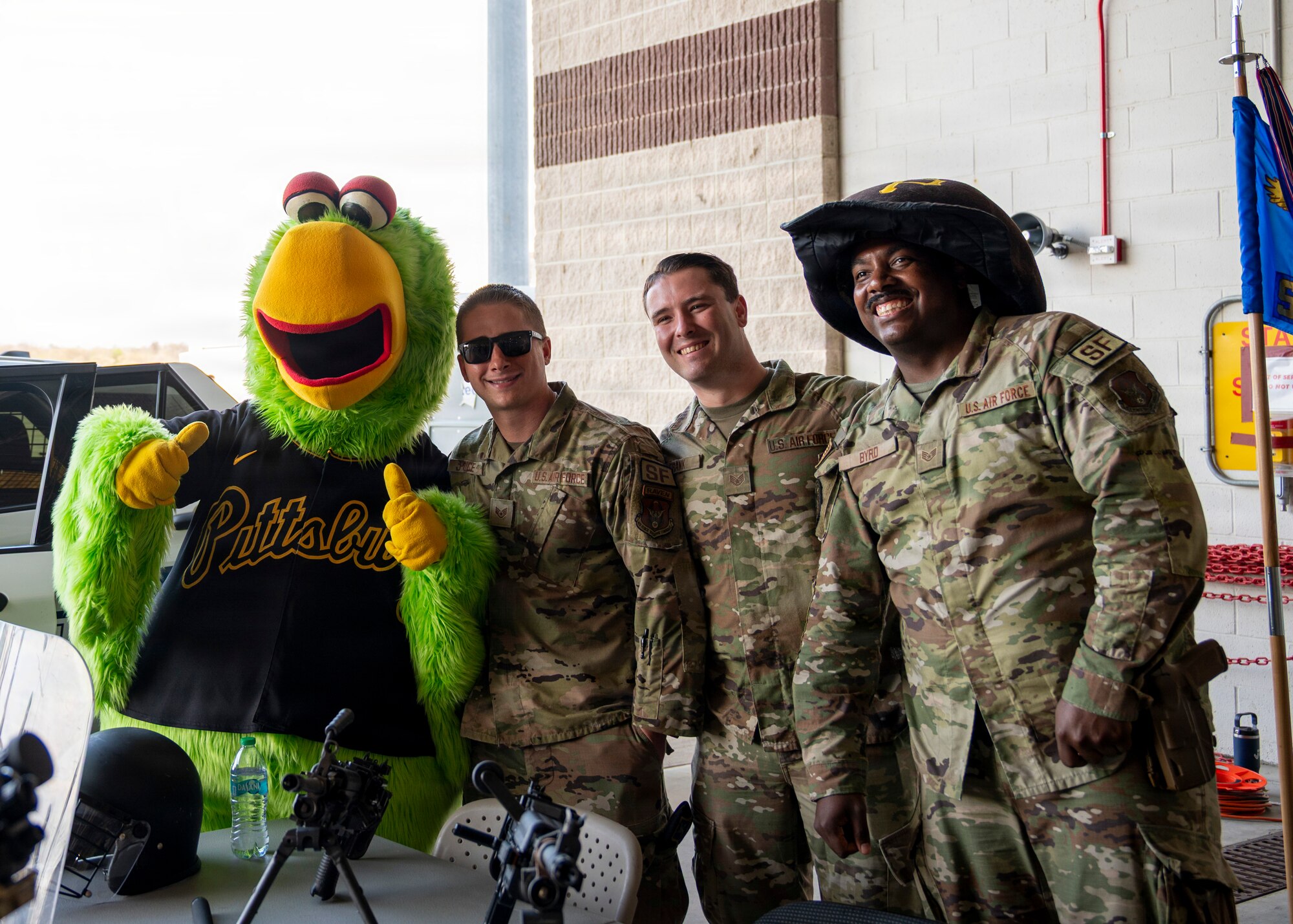 Airman from the 171st Air Refueling Wing take a photo with Pirate Parrot, the official mascot for the Pittsburgh Pirates, during an All-Star Leadership Day in Pittsburgh, Pennsylvania, April 15, 2026. Airmen shared their experiences and perspectives, encouraging students to consider leadership roles and STEM-focused careers within the U.S. Air Force. (U.S. Air National Guard photo by Tech. Sgt. Zoe M. Wockenfuss)