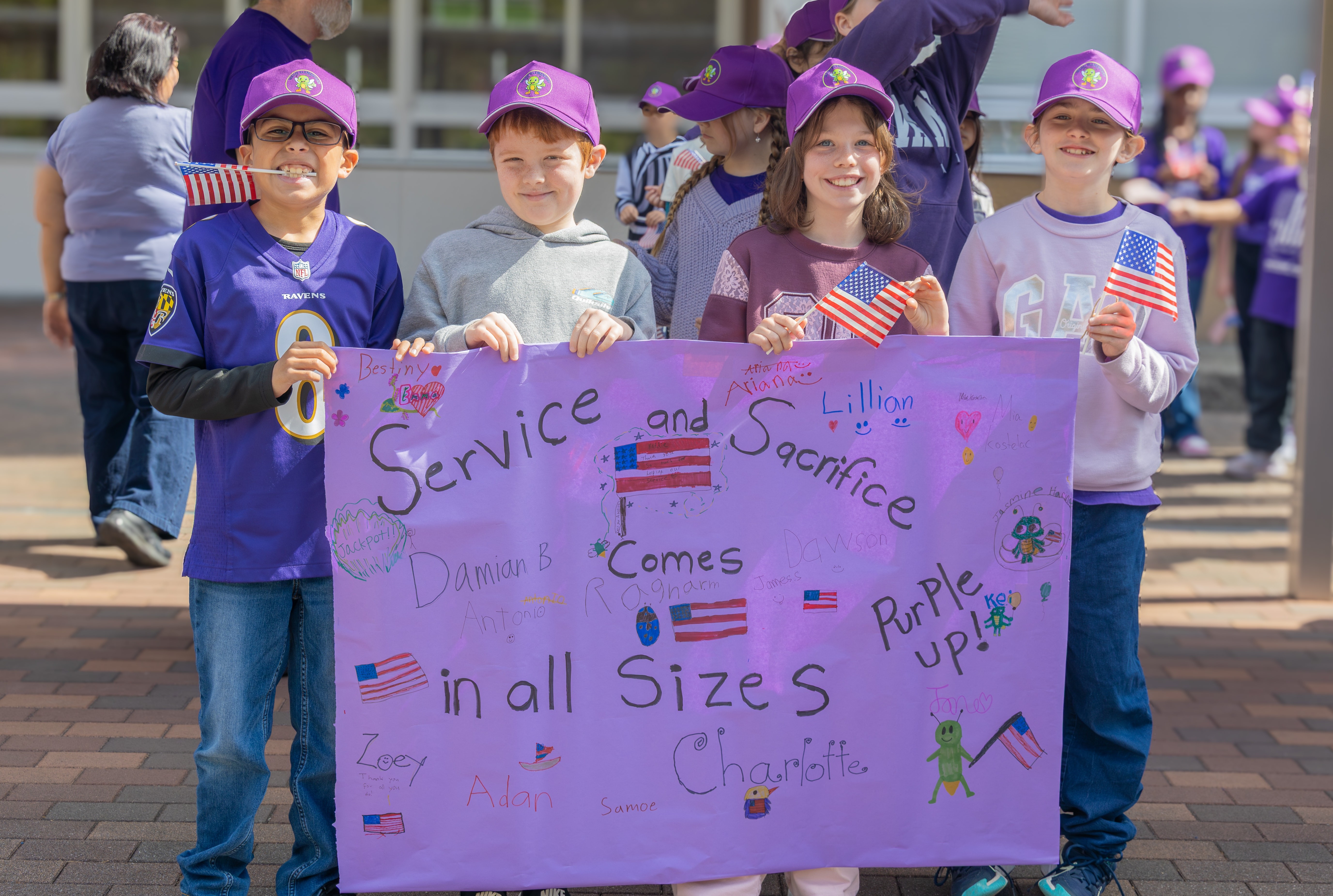 IKEGO HILLS FAMILY HOUSING AREA, Japan (April 9, 2026) -- Students and faculty from Ikego Elementary School march in a “Purple Up! For Military Kids” parade at Ikego Hills Family Housing on April 9, 2026. Purple Up! For Military Kids is held in observance of Month of the Military Child and highlights the strength and adaptability of military-connected youth, acknowledging their vital role in maintaining a stable and resilient home front for the joint force. (U.S. Navy photo by Sheryl Sullivan)