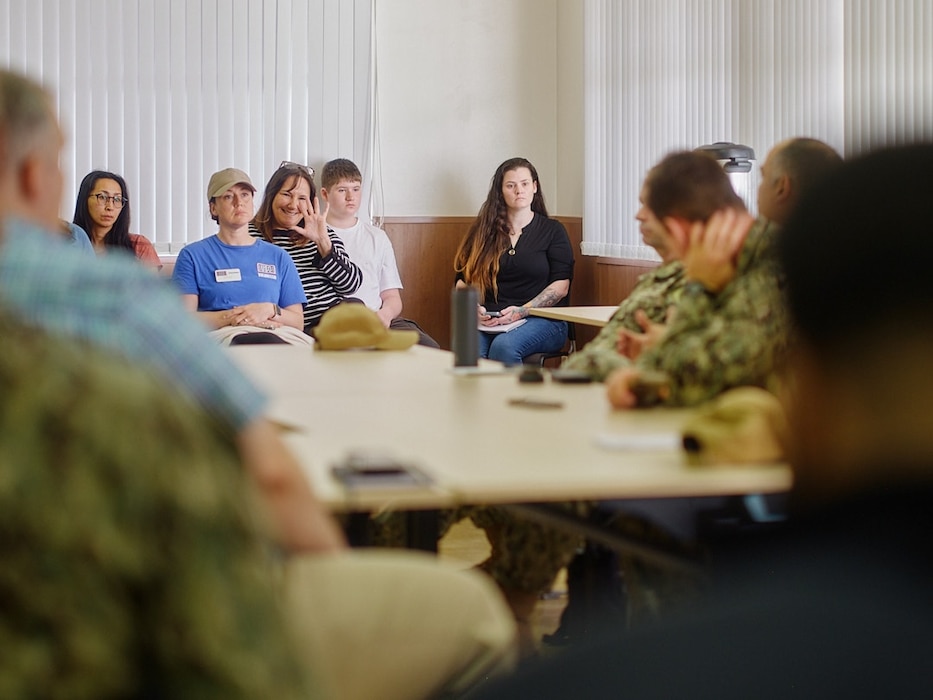 IKEGO HILLS FAMILY HOUSING AREA, Japan (April 9, 2026) --Coleen Balent, a Fleet Activities Yokosuka community member, asks for time to speak at Cup of Joe with the CO at Ikego Hills Family Housing Area's Nikko Tower Community Room in Zushi, Japan April 9, 2026. Cup of Joe with the CO is a monthly meeting providing an opportunity for base community members and command leadership to discuss family readiness, address concerns, and bring up ideas for improvement. (U.S. Navy photo by James Kimber)