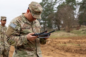 Soldier flying the RQ-28 during Combined Resolve Drone Validation Training