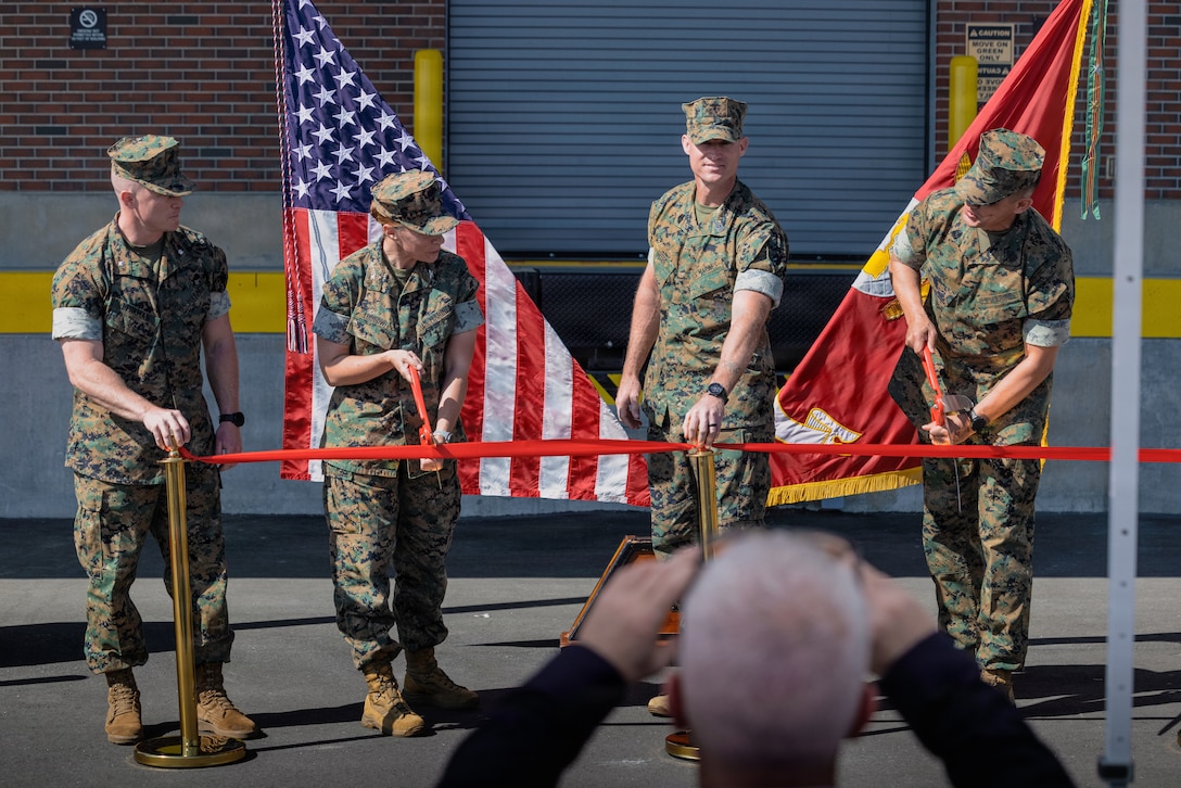 U.S. Marine Corps leaders participate in a ribbon cutting ceremony at the new Individual Issue Facility on Marine Corps Base Camp Lejeune, North Carolina, April 14, 2026. The new Class II Logistics Facility consolidates both the Consolidated Storage Program’s high-volume Individual Issue Facility operations and the Class II Sustainment Program’s technical maintenance and repair mission, ensuring Marines are more efficiently equipped and mission ready. (U.S. Marine Corps photo by Lance Cpl. DeCrane)