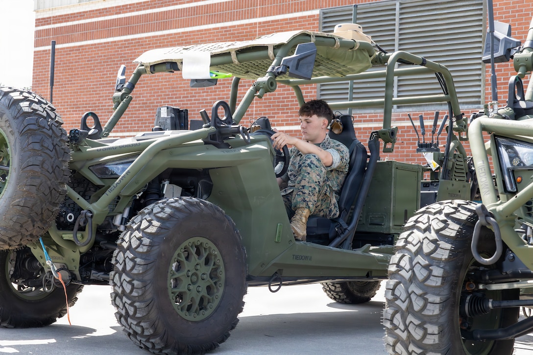 U.S. Marine Corps Cpl. Dean Woods, from Georgia, an air defense systems technician with 2nd Low Altitude Air Defense Battalion, Marine Air Control Group 28, 2nd Marine Aircraft Wing, prepares to move a Light Marine Air Defense Integrated System at Marine Corps Air Station Cherry Point, North Carolina, April 14, 2026. The LMADIS provides improved ground-based air defense weapon systems to 2nd LAAD, further enhancing 2nd MAW’s ability to degrade the threat of enemy small unmanned aerial systems. (U.S. Marine Corps photo by Lance Cpl. Donovan Pimentel)