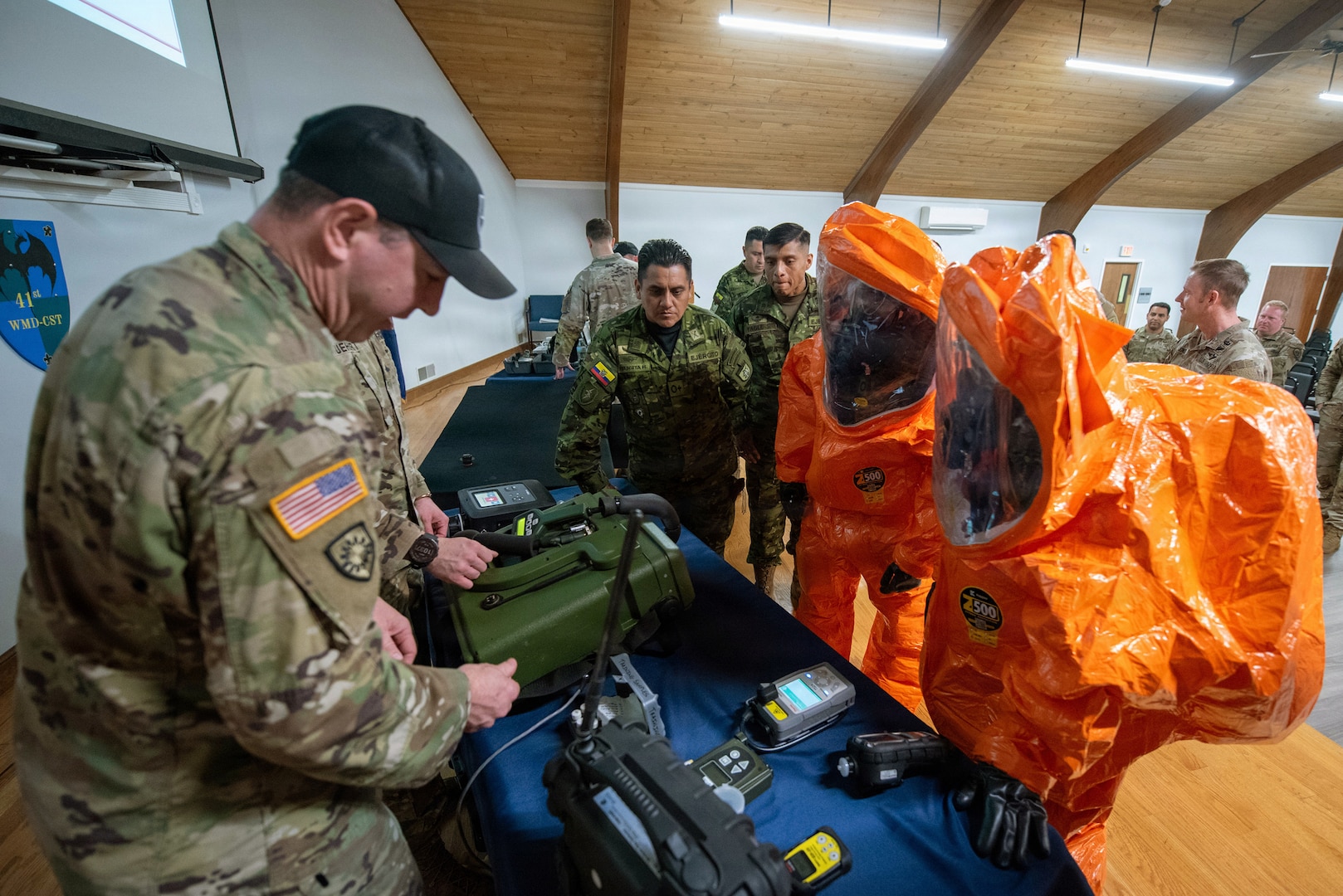 A U.S. Army Soldier from the Kentucky National Guard’s 41st Weapons of Mass Destruction Civil Support Team demonstrates equipment used to test for hazardous airborne isotopes for members of the Ecuadorian military at the Kentucky Air National Guard base in Louisville, Ky., March 9, 2026.