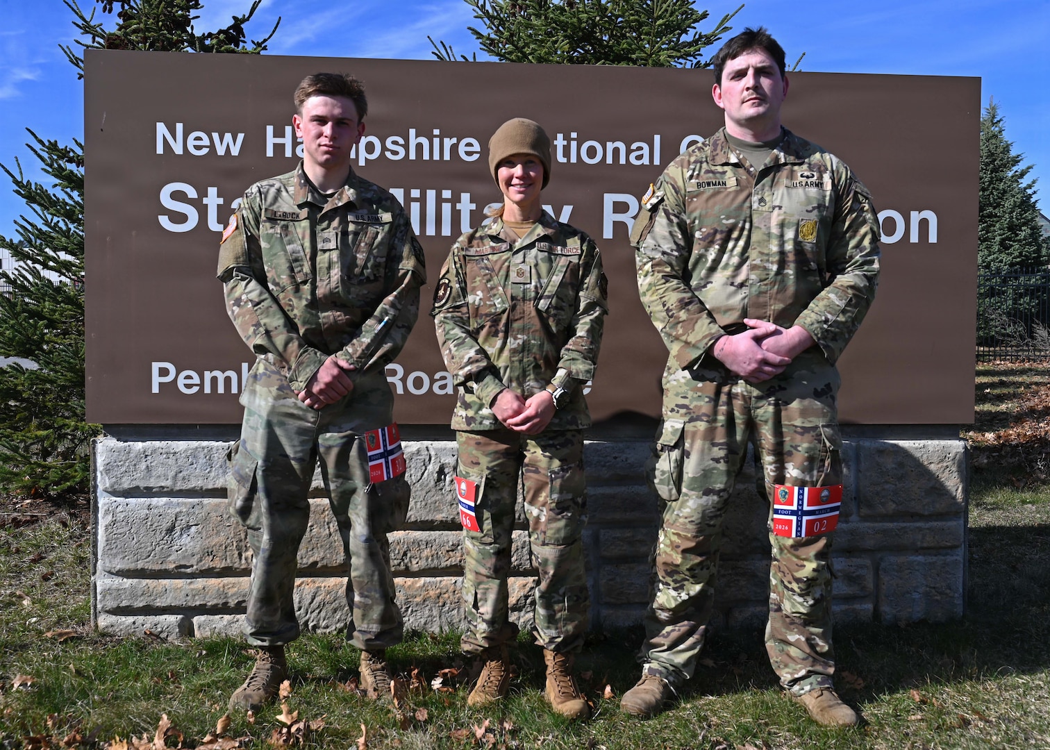 From left, Cadet Quinn LaRock of University of New Hampshire’s Army ROTC program; Master Sgt. Amber Martine, 157th Security Forces Squadron; New Hampshire Air National Guard; and Staff Sgt. Timothy Bowman, recruiter with New England Recruiting Battalion; assemble after completing a Norwegian Foot March on April 12, 2026, at the state military reservation in Concord, New Hampshire.