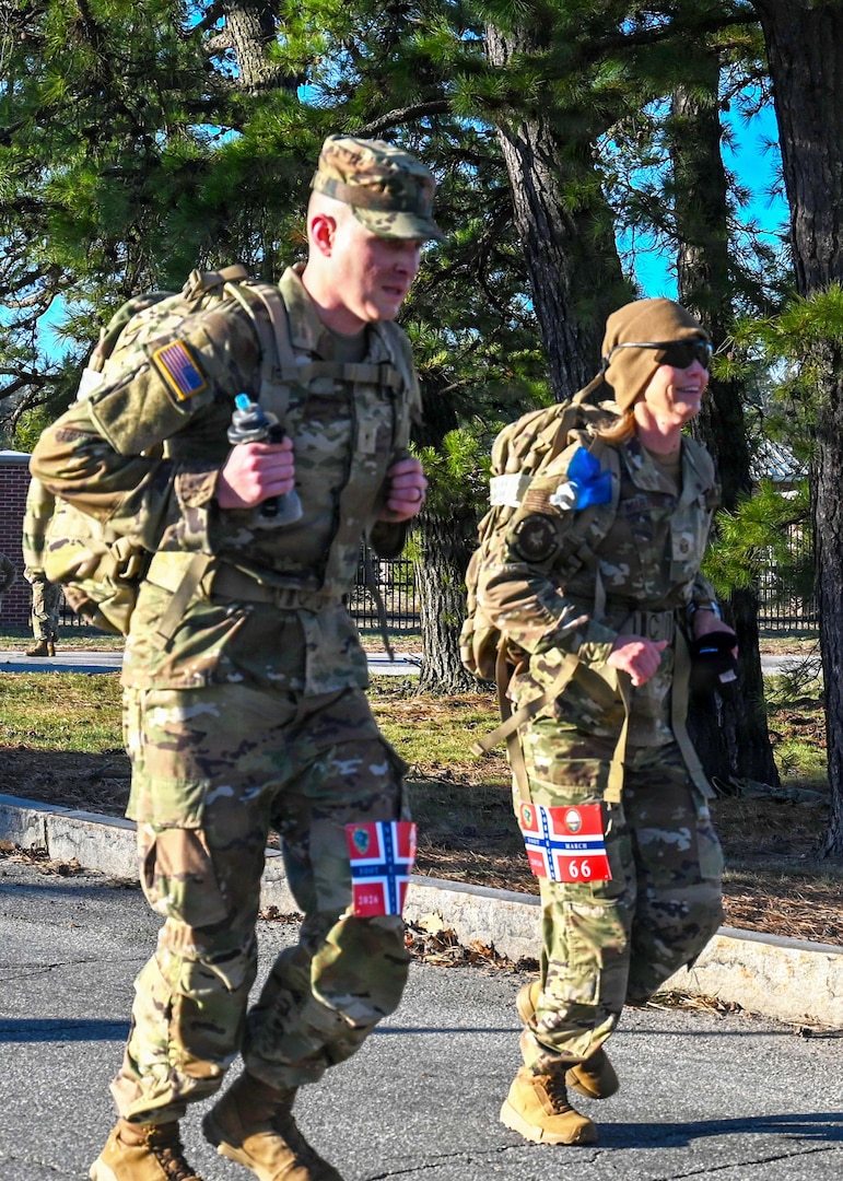 Competitors race along the state military reservation during a Norwegian Foot March on March on April 12, 2026, in Concord, New Hampshire.