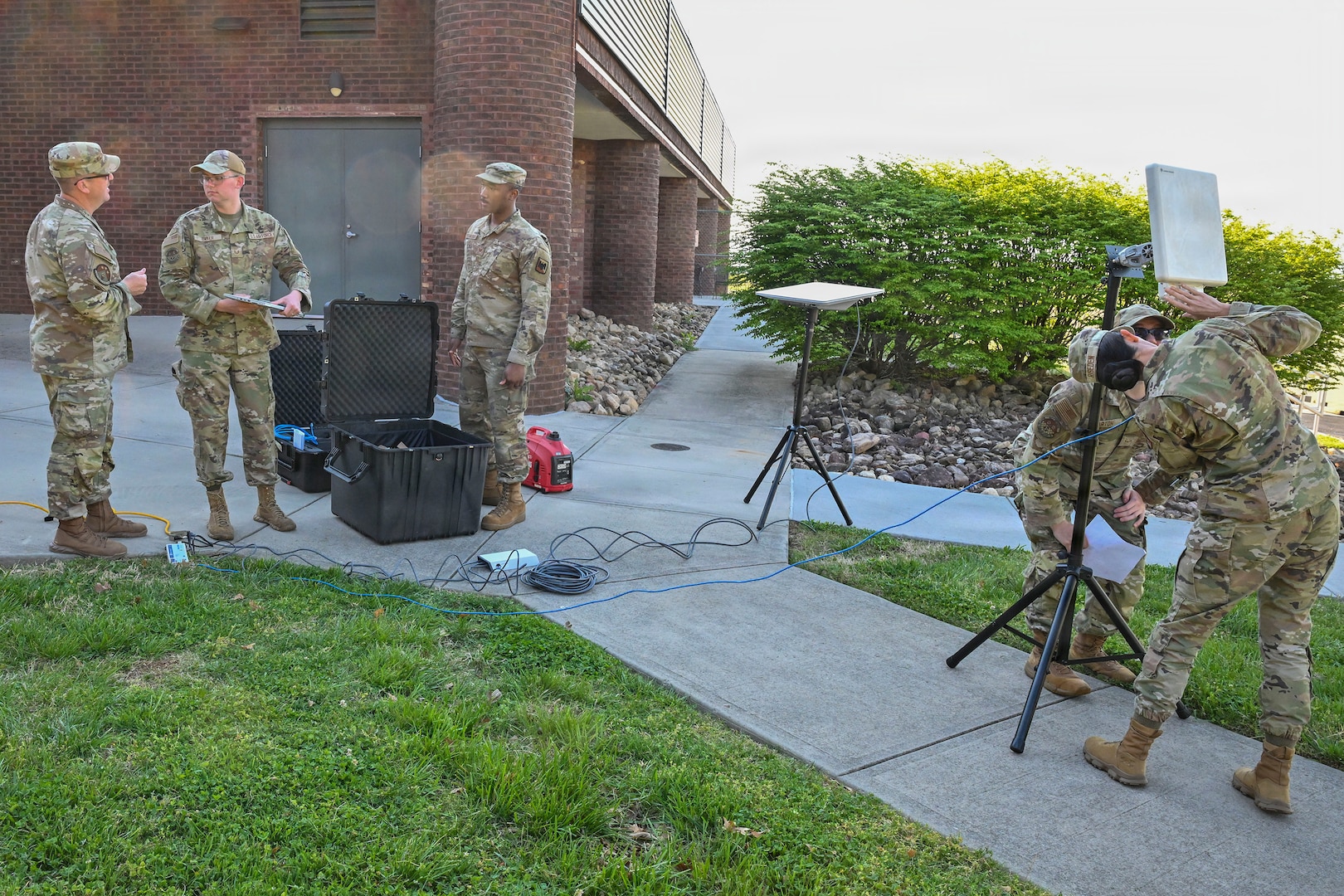 U.S. Air Force Airmen from the I.G. Brown Training and Education Center, Cyber Operations, and 134th Air Refueling Wing, Communications Squadron, prepare a Starlink satellite system to test connectivity, April 9, 2026, McGhee Tyson Air National Guard Base, Tennessee.