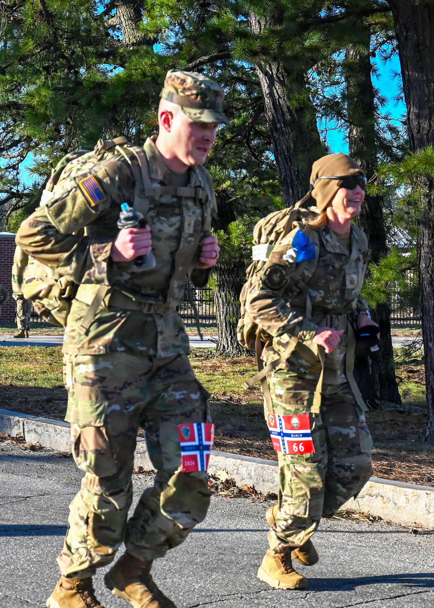 Competitors race along the state military reservation during a Norwegian Foot March on March on April 12, 2026, in Concord, New Hampshire.