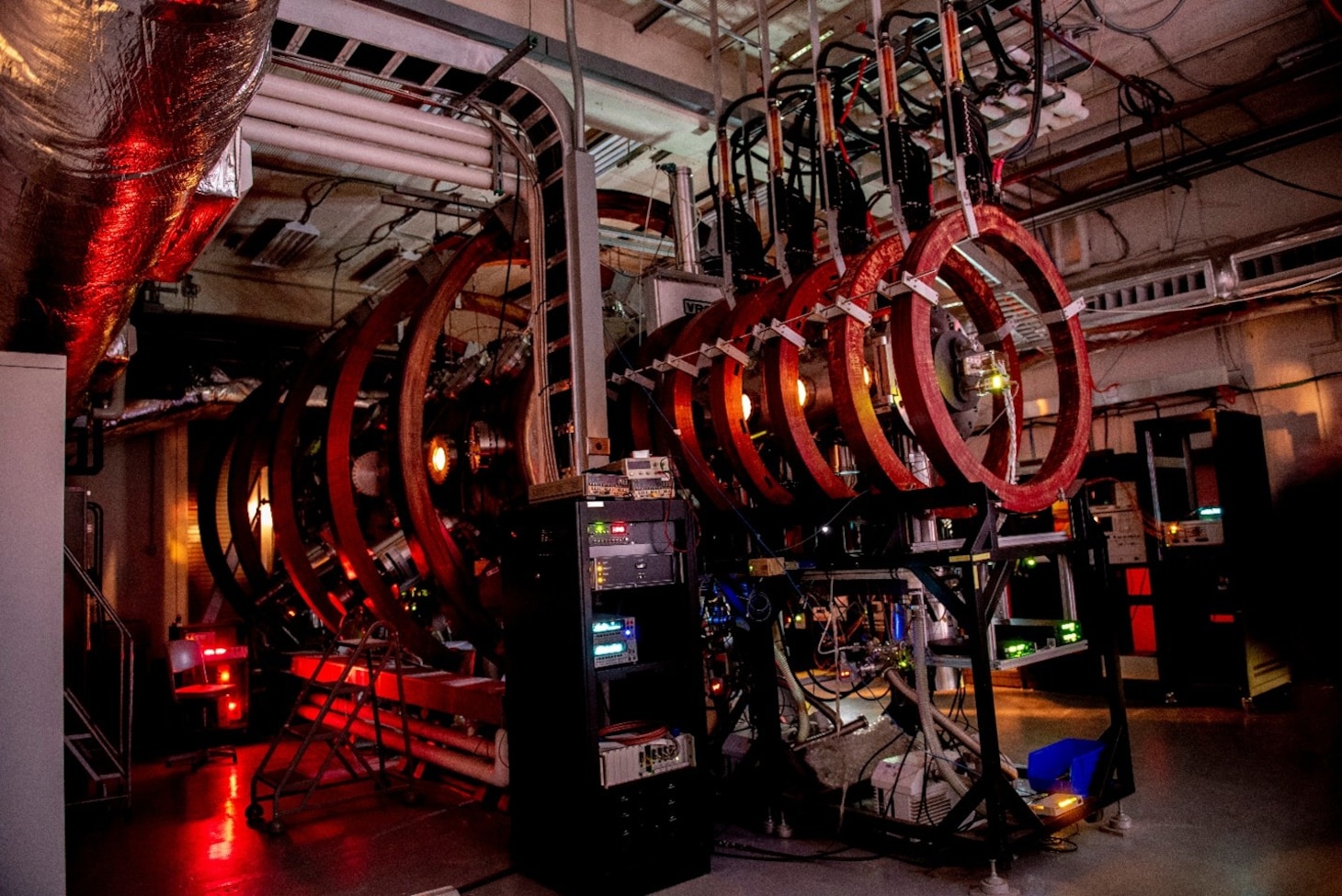 The Space Physics Simulation chamber. A large vacuum chamber that can recreate plasma conditions in space to study basic plasma physics phenomena and test hardware operation in a simulated environment before flight.  (U.S. Navy photo)