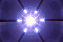 Six plasma guns shoot Teflon plasma towards the central axis of a plasma-filled rod pinch diode. This pulsed power device, developed by the U.S. Naval Research Laboratory, produces an intense, fast x-ray pulse, enabling new capabilities for radiography of military materials and components. (U.S. Navy photo)