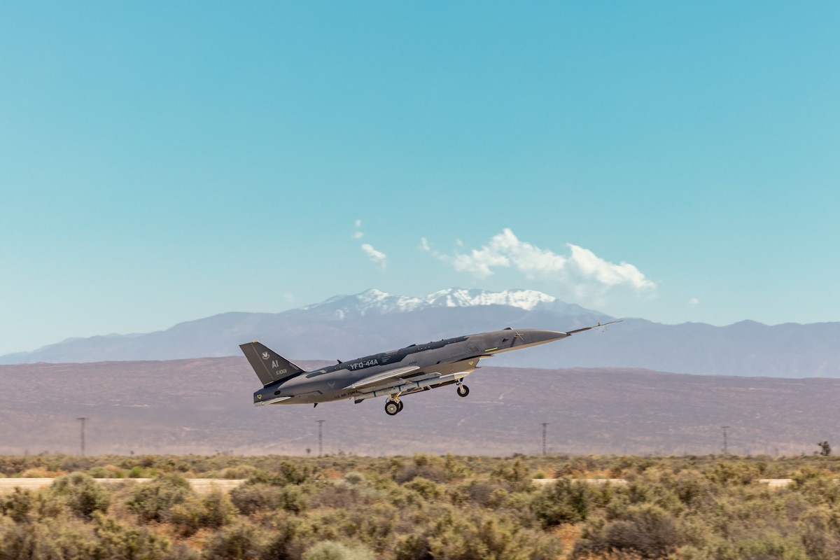 A YFQ-44A takes off from the runway at Edwards Air Force Base, Calif., during a Collaborative Combat Aircraft exercise. The Experimental Operations Unit’s exercise united the test authorities of Air Force Materiel Command and the operational authorities of Air Combat Command to fast-track hands-on experimentation at an early stage of development. (U.S. Air Force photo by Ariana Ortega)